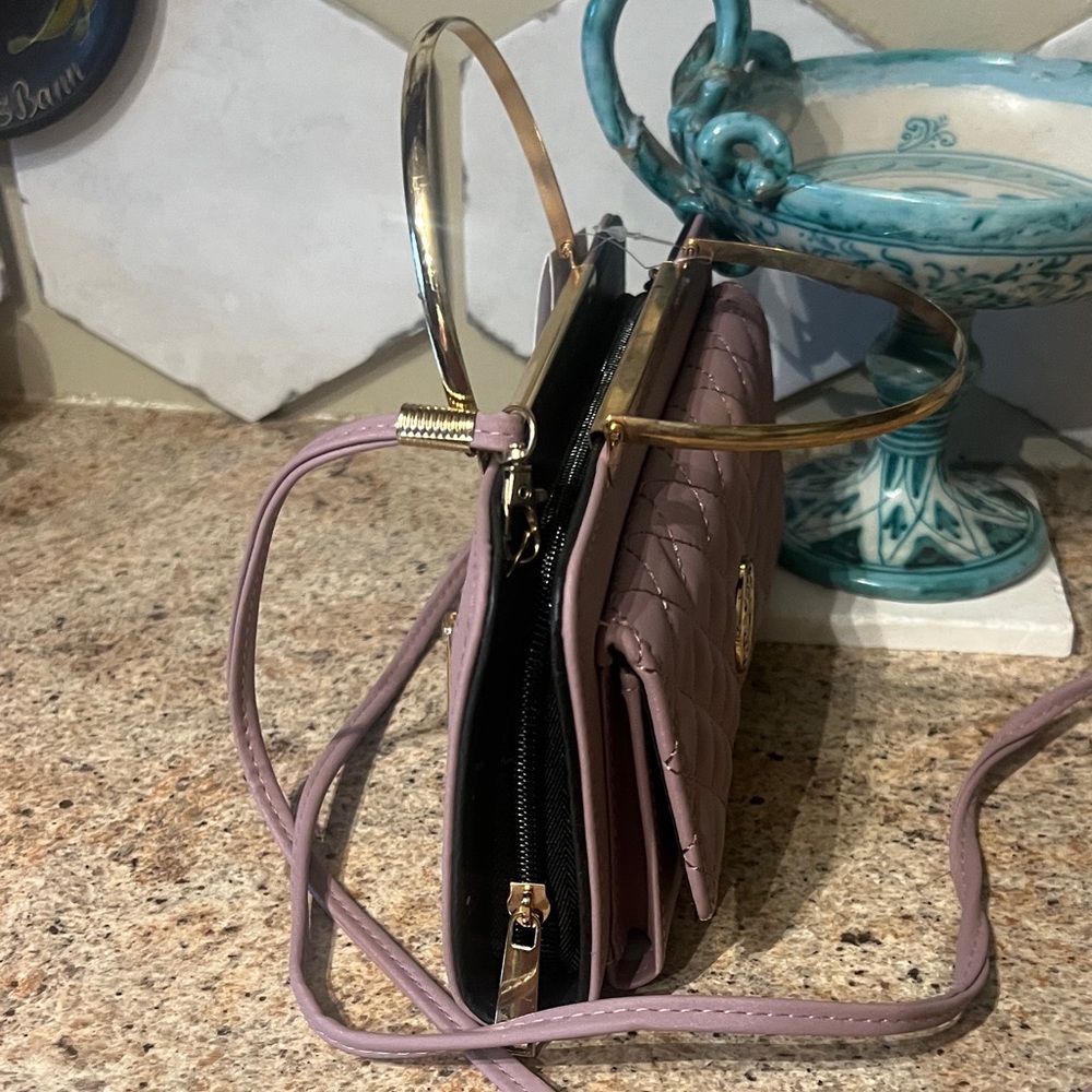 Elegant Quilted Handbag with Gold Accents